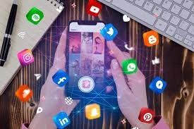 Symbol of digital connectivity, a person using a smartphone surrounded by social media icon